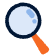 Ikona przedstawiająca powiększoną lupę z niebieską soczewką i pomarańczową rączką, symbolizującą wyszukiwanie lub eksplorację.