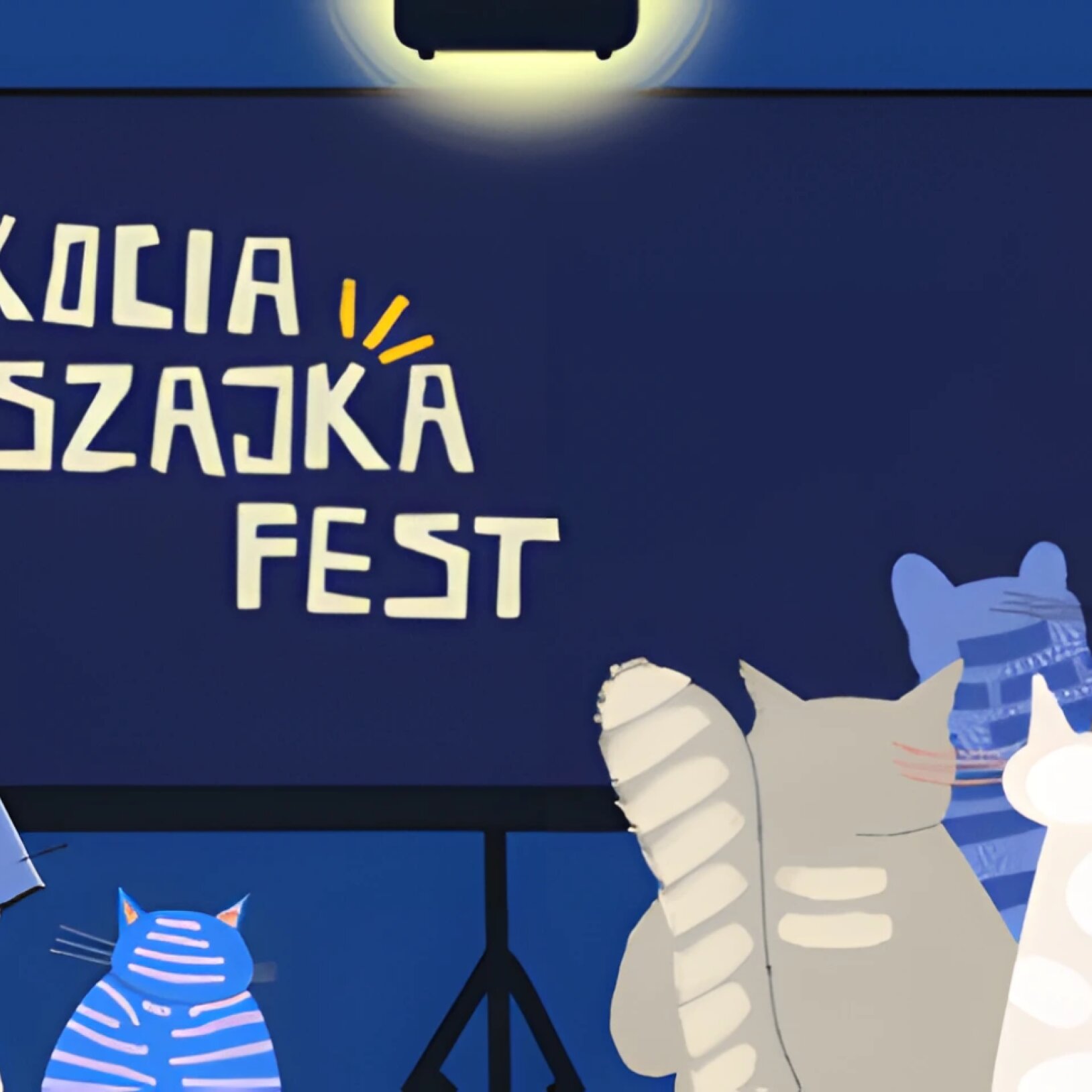 Ilustracja przedstawiająca grupę różnobarwnych kotów siedzących przed dużym ekranem, na którym wyświetlany jest napis KOCIA SZAJKA FEST.